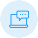 Blue icon of a laptop with a speech bubble containing three dots, indicating online messaging or communication, centered on a light blue circular background.